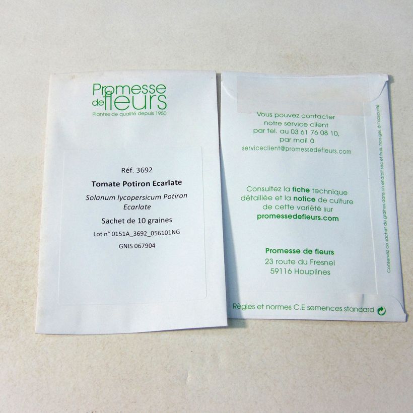 Voorbeeld van een exemplaar van Scharlakenrode pompoentomaat het zakje met 10 zaden zoals geleverd
